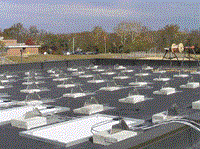 AC units on the roof of a building - side view