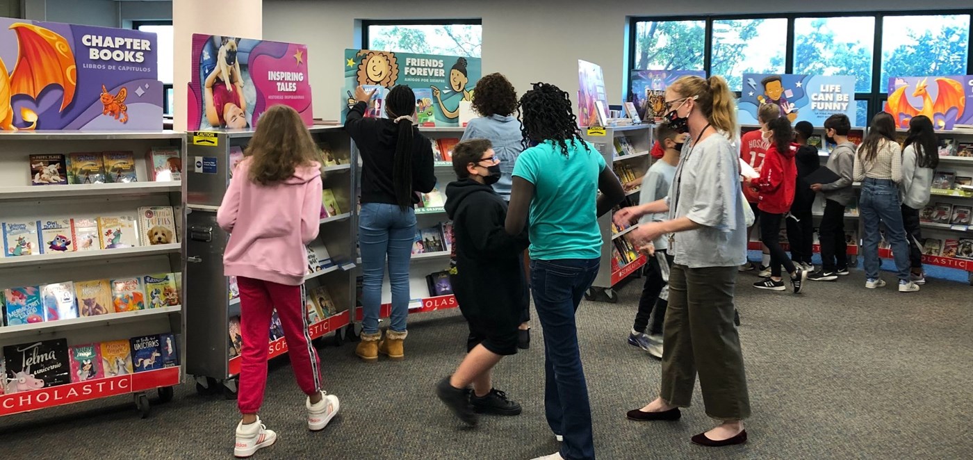 Students browsing the Book Fair