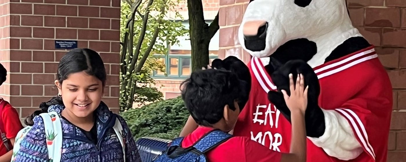 The Chick-fil-A Cow Greets Hartford Students on the First Day of School