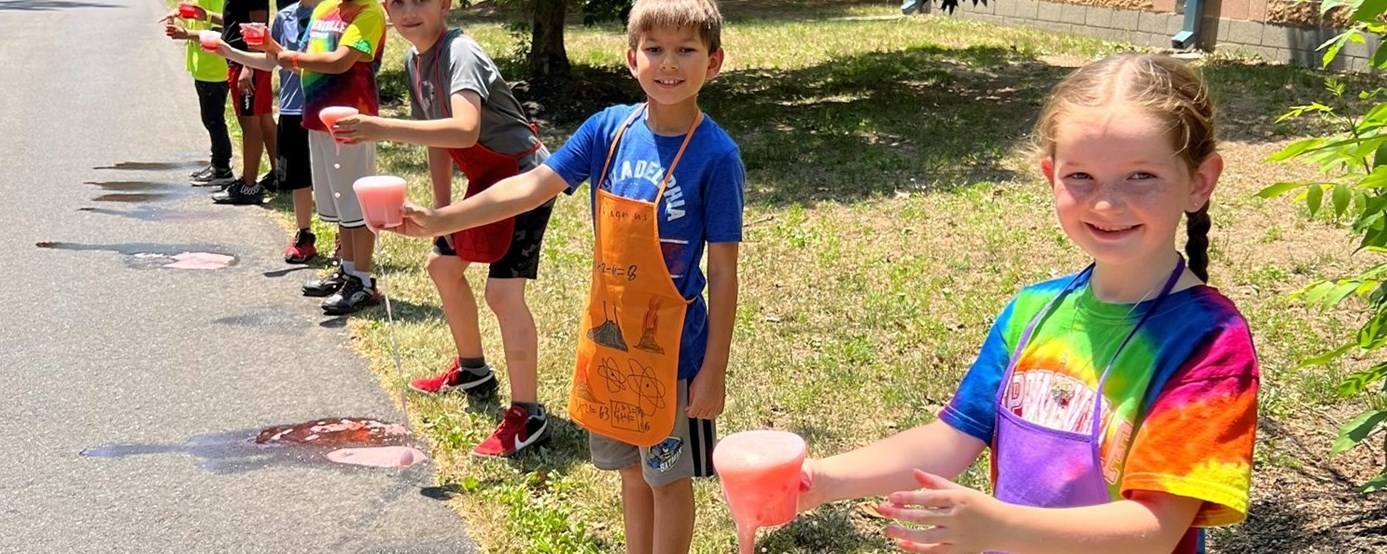 2nd grade students conducting an experiment