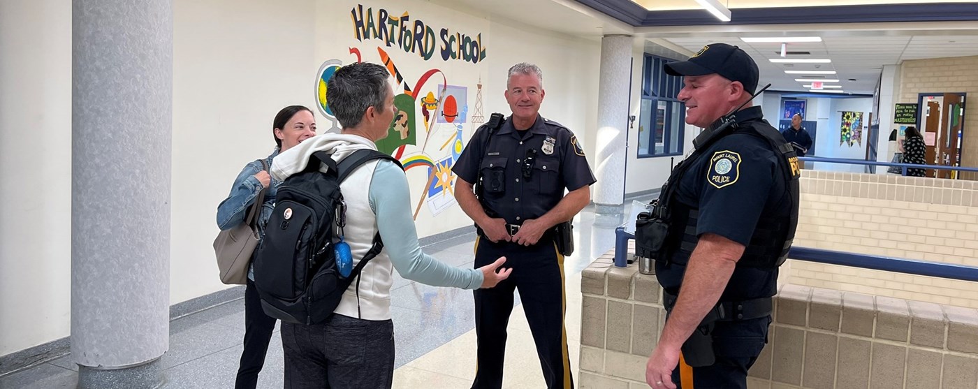 Community Safety Officers talking with parents