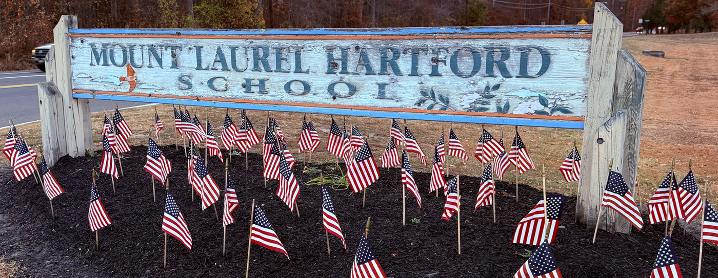 Hartford Sign with American Flags