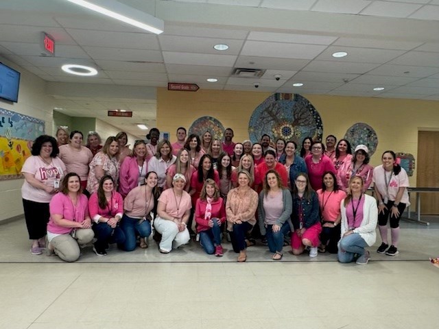 staff members supporting a Springville teacher